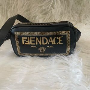 Logo camera bag Fendace. Fendace was a collaboration between fendi and versace